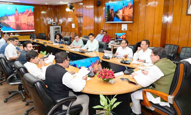 धामी ने उत्तराखंड के बीच संपत्ति हस्तांतरण मामलों की स्थिति की समीक्षा की